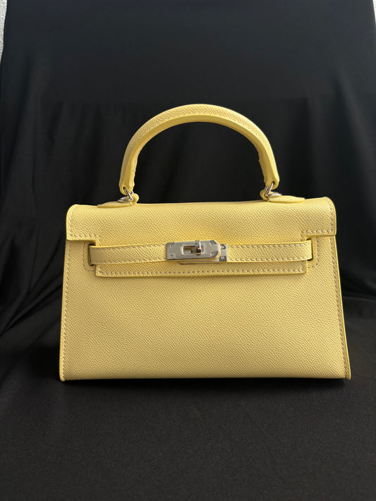 Habiba bag butter yellow silver details